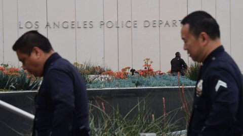 LAPD officers return to headquarters on March 4, 2016, folllowing a press conference where Los Angeles police announced an investigation into whether a knife purportedly found on property once owned by O.J. Simpson is evidence in the murder of Nicole Brown Simpson and Ronald Goldman. Los Angeles police are investigating and testing a knife that was allegedly recovered on property once owned by former football star O.J. Simpson, a spokesman said Friday. / AFP / FREDERIC J. BROWN (Photo credit should read FREDERIC J. BROWN/AFP via Getty Images)