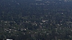 CUPERTINO, CA - APRIL 28: An aerial view of the new Apple headquarters on April 28, 2017 in Cupertino, California. Apple's new 175-acre 'spaceship' campus dubbed "Apple Park" is nearing completion and is set to begin moving in Apple employees. The new headquarters, designed by Lord Norman Foster and costing roughly $5 billion, will house 13,000 employees in over 2.8 million square feet of office space and will have nearly 80 acres of parking to accommodate 11,000 cars. (Photo by Justin Sullivan/Getty Images)
