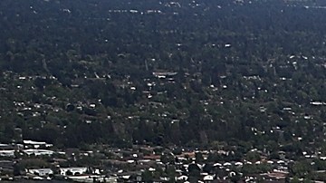 CUPERTINO, CA - APRIL 28: An aerial view of the new Apple headquarters on April 28, 2017 in Cupertino, California. Apple's new 175-acre 'spaceship' campus dubbed "Apple Park" is nearing completion and is set to begin moving in Apple employees. The new headquarters, designed by Lord Norman Foster and costing roughly $5 billion, will house 13,000 employees in over 2.8 million square feet of office space and will have nearly 80 acres of parking to accommodate 11,000 cars. (Photo by Justin Sullivan/Getty Images)
