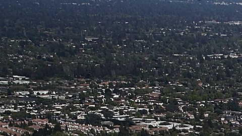 CUPERTINO, CA - APRIL 28: An aerial view of the new Apple headquarters on April 28, 2017 in Cupertino, California. Apple's new 175-acre 'spaceship' campus dubbed "Apple Park" is nearing completion and is set to begin moving in Apple employees. The new headquarters, designed by Lord Norman Foster and costing roughly $5 billion, will house 13,000 employees in over 2.8 million square feet of office space and will have nearly 80 acres of parking to accommodate 11,000 cars. (Photo by Justin Sullivan/Getty Images)