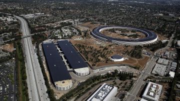CUPERTINO, CA - APRIL 28: An aerial view of the new Apple headquarters on April 28, 2017 in Cupertino, California. Apple's new 175-acre 'spaceship' campus dubbed "Apple Park" is nearing completion and is set to begin moving in Apple employees. The new headquarters, designed by Lord Norman Foster and costing roughly $5 billion, will house 13,000 employees in over 2.8 million square feet of office space and will have nearly 80 acres of parking to accommodate 11,000 cars. (Photo by Justin Sullivan/Getty Images)