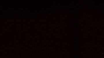 A firefighter drags a hose on San Pedro Street after a fire in a single-story commercial building sparked an explosion in the Toy District of downtown Los Angeles on May 16, 2020. - At least 11 firefighters were injured in downtown Los Angeles when a fire in a commercial building sparked a major explosion and spread to nearby structures, fire officials said. Some 230 responders battled the blaze as it spread to other buildings in the area before it was extinguished around two hours after it began. (Photo by Apu GOMES / AFP) (Photo by APU GOMES/AFP via Getty Images)