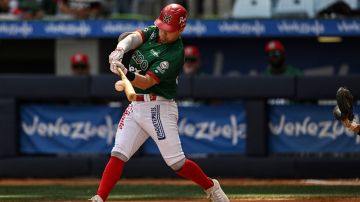 Mexico's Caneros de Los Mochis infielder Irving Lopez hits the ball during the third place Caribbean Series baseball game against Colombia's Vaqueros de Monteria at the Monumental Simon Bolivar stadium on February 10, 2023. (Photo by Yuri CORTEZ / AFP) (Photo by YURI CORTEZ/AFP via Getty Images)