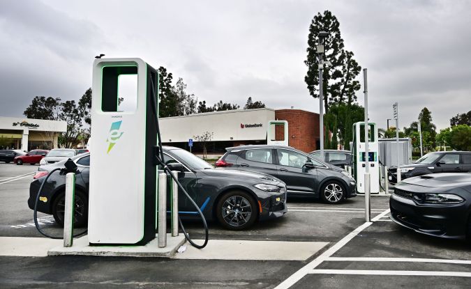 Eelectric vehicles are charging at a charging station in Monterey Park, California, on April 12, 2023. - US President Joe Biden's administration unveiled new proposed auto emissions rules, aiming to accelerate the electric vehicle transition with a target of two-thirds of the new US car market by 2032. (Photo by Frederic J. BROWN / AFP) (Photo by FREDERIC J. BROWN/AFP via Getty Images)