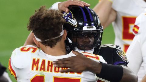 BALTIMORE, MARYLAND - SEPTEMBER 28: Quarterbacks Patrick Mahomes #15 of the Kansas City Chiefs and Lamar Jackson #8 of the Baltimore Ravens hug following the Chiefs win at M&T Bank Stadium on September 28, 2020 in Baltimore, Maryland. (Photo by Rob Carr/Getty Images)