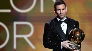 PARIS, FRANCE - NOVEMBER 29: Lionel Messi is awarded with his seventh Ballon D'Or award during the Ballon D'Or Ceremony at Theatre du Chatelet on November 29, 2021 in Paris, France. (Photo by Aurelien Meunier/Getty Images)