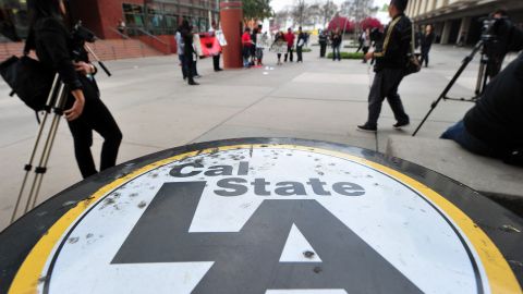 Members of the media arrive for a protest at the California State University of Los Angeles campus on March 6, 2012 in California, where a demonstration was held to protest CSULA's and other California universities ``lack of support to end the budget cuts.'' AFP PHOTO/Frederic J. BROWN (Photo credit should read FREDERIC J. BROWN/AFP via Getty Images)