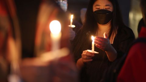 SAN FRANCISCO, CALIFORNIA - JANUARY 26: People hold candles during a candlelight vigil for the victims of the recent mass shootings in Monterey Park and Half Moon Bay on January 26, 2023 in San Francisco, California. Hundreds of people attended a candlelight vigil to honor the victims of back-to-back mass shootings in northern and southern California this past week. 18 people were shot and killed in the separate events. (Photo by Justin Sullivan/Getty Images)