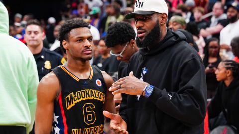 HOUSTON, TEXAS - MARCH 28: Bronny James #6 of the West team talks to Lebron James of the Los Angeles Lakers after the 2023 McDonald's High School Boys All-American Game at Toyota Center on March 28, 2023 in Houston, Texas. (Photo by Alex Bierens de Haan/Getty Images)