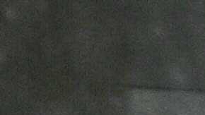 A person runs outside a gas station during heavy rains from Tropical Storm Hilary, in south Los Angeles, California, on August 20, 2023. Hurricane Hilary weakened to a tropical storm on August 20, 2023, as it barreled up Mexico's Pacific coast, but was still likely to bring life-threatening flooding to the typically arid southwestern United States, forecasters said. Authorities reported at least one fatality in northwestern Mexico, where Hilary lashed the Baja California Peninsula with heavy rain and strong winds. (Photo by Robyn BECK / AFP) (Photo by ROBYN BECK/AFP via Getty Images)