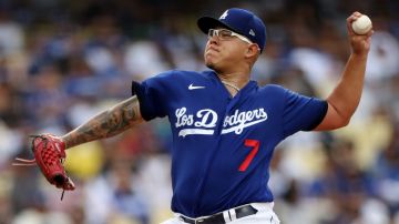 LOS ANGELES, CALIFORNIA - AUGUST 19: Julio Urias #7 of the Los Angeles Dodgers pitches against the Miami Marlins during the second inning at Dodger Stadium on August 19, 2023 in Los Angeles, California. (Photo by Harry How/Getty Images)