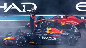 ABU DHABI, UNITED ARAB EMIRATES - NOVEMBER 26: Race winner Max Verstappen of the Netherlands and Oracle Red Bull Racing celebrates in parc ferme during the F1 Grand Prix of Abu Dhabi at Yas Marina Circuit on November 26, 2023 in Abu Dhabi, United Arab Emirates. (Photo by Clive Rose/Getty Images)