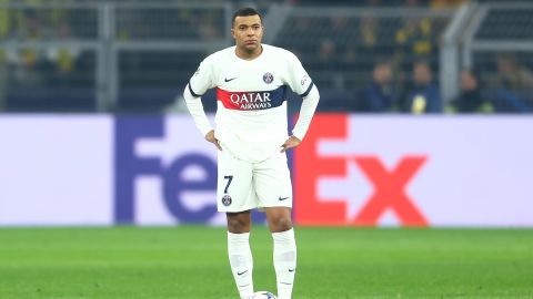 DORTMUND, GERMANY - DECEMBER 13: Kylian Mbappe of Paris Saint-Germain looks dejected after Karim Adeyemi of Borussia Dortmund scores their team's first goal during the UEFA Champions League match between Borussia Dortmund and Paris Saint-Germain at Signal Iduna Park on December 13, 2023 in Dortmund, Germany. (Photo by Leon Kuegeler/Getty Images)