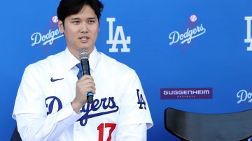 LOS ANGELES, CALIFORNIA - DECEMBER 14: Shohei Ohtani of the Los Angeles Dodgers speaks to the media at Dodger Stadium on December 14, 2023 in Los Angeles, California. (Photo by Meg Oliphant/Getty Images)