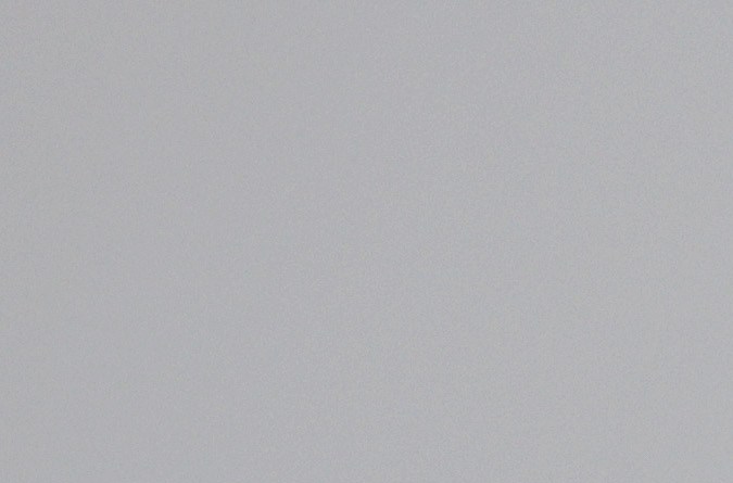 EL SEGUNDO, CALIFORNIA - DECEMBER 29:A surfer waits on a jetty on his way to enter the water as a large wave crashes near the beach December 29, 2023 in El Segundo, California. Dangerous surf churned up by storms in the Pacific is impacting much of California’s coastline with coastal flooding possible in some low-lying areas. (Photo by Mario Tama/Getty Images)