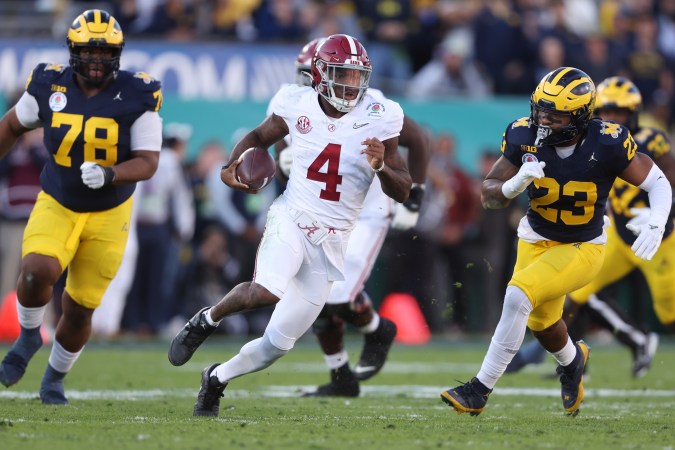 PASADENA, CALIFORNIA - JANUARY 01: Jalen Milroe #4 of the Alabama Crimson Tide runs with the ball in the second quarter against the Michigan Wolverines during the CFP Semifinal Rose Bowl Game at Rose Bowl Stadium on January 01, 2024 in Pasadena, California. (Photo by Sean M. Haffey/Getty Images)