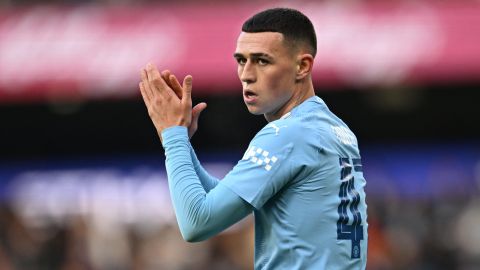 Manchester City's English midfielder #47 Phil Foden reacts after scoring the opening goal of the English FA Cup third round football match between Manchester City and Huddersfield Town at the Etihad Stadium in Manchester, north west England, on January 7, 2024. (Photo by Paul ELLIS / AFP) / RESTRICTED TO EDITORIAL USE. No use with unauthorized audio, video, data, fixture lists, club/league logos or 'live' services. Online in-match use limited to 120 images. An additional 40 images may be used in extra time. No video emulation. Social media in-match use limited to 120 images. An additional 40 images may be used in extra time. No use in betting publications, games or single club/league/player publications. / (Photo by PAUL ELLIS/AFP via Getty Images)