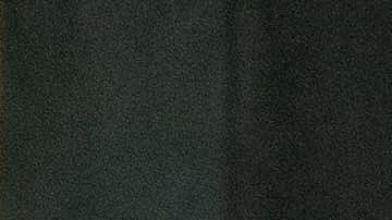 A black and white picture of German football legend Franz Beckenbauer is on display at the Hofkapelle in Munich, southern Germany, where a book of condolences is open to the public on January 10, 2024. German football legend Franz Beckenbauer, world champion as a player in 1974 and as coach in 1990, died on January 8, 2024 at the age of 78, the German Federation (DFB) announced on January 8, 2024. (Photo by LUKAS BARTH-TUTTAS / AFP) (Photo by LUKAS BARTH-TUTTAS/AFP via Getty Images)