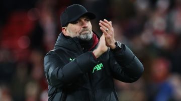 LIVERPOOL, ENGLAND - JANUARY 10: Juergen Klopp, Manager of Liverpool, applauds the fans after the team's victory in the Carabao Cup Semi Final First Leg match between Liverpool and Fulham at Anfield on January 10, 2024 in Liverpool, England. (Photo by Clive Brunskill/Getty Images)
