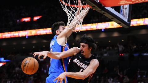 MIAMI, FLORIDA - JANUARY 10: Jaime Jaquez Jr. #11 of the Miami Heat passes around Chet Holmgren #7 of the Oklahoma City Thunder during the third quarter at Kaseya Center on January 10, 2024 in Miami, Florida. NOTE TO USER: User expressly acknowledges and agrees that, by downloading and or using this photograph, User is consenting to the terms and conditions of the Getty Images License Agreement. (Photo by Rich Storry/Getty Images)