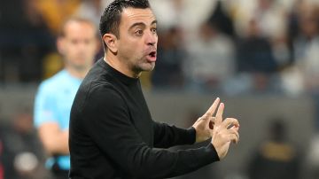 Barcelona's Spanish coach Xavi directs his players during the Spanish Super Cup final football match between Real Madrid and Barcelona at the Al-Awwal Park Stadium in Riyadh, on January 14, 2024. (Photo by Giuseppe CACACE / AFP) (Photo by GIUSEPPE CACACE/AFP via Getty Images)