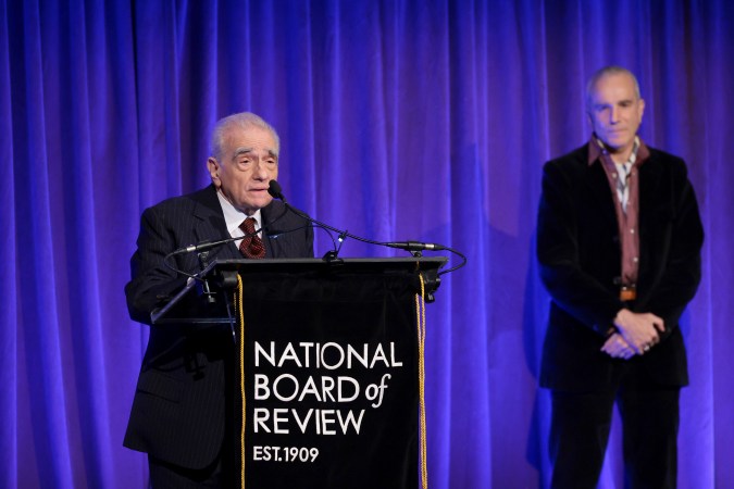 NEW YORK, NEW YORK - JANUARY 11: (L-R) Martin Scorsese accepts the Best Director award for "Killers of the Flower Moon" from Daniel Day Lewis onstage during the National Board Of Review 2024 Awards Gala at Cipriani 42nd Street on January 11, 2024 in New York City. (Photo by Dimitrios Kambouris/Getty Images for National Board of Review)