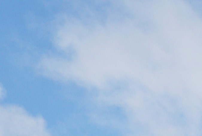 SAN DIEGO, CALIFORNIA - JANUARY 23: A person (R) works to help tow away a vehicle dislodged by flooding the day after an explosive rainstorm caused flooding in areas of San Diego County on January 23, 2024 in San Diego, California. The intense rains forced dozens of rescues while flooding roadways and homes and knocking out electricity for thousands of residents. (Photo by Mario Tama/Getty Images)