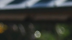 SAN DIEGO, CALIFORNIA - JANUARY 23: A person stands near a vehicle moved by flooding that remains lodged on a fence the day after an explosive rainstorm deluged areas of San Diego County on January 23, 2024 in San Diego, California. The intense rains forced dozens of rescues while flooding roadways and homes and knocking out electricity for thousands of residents. (Photo by Mario Tama/Getty Images)