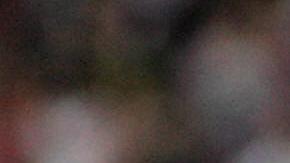 BANGKOK, THAILAND: Real Madrid's midfielder David Beckham of England (L) and team-mate Ronaldo Luiz wait for the playing of the national anthems prior to an exhibition match against Thailand in Bangkok, 29 July 2005. Real Madrid defeated Thailand with a score of 3-0. AFP PHOTO/SAEED KHAN (Photo credit should read SAEED KHAN/AFP via Getty Images)