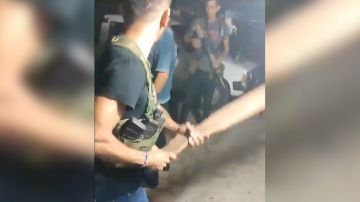 sicarios golpean a policía
