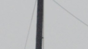 A road worker stops to talk to a Highway Patrol officer at a road closure, where there was a rock slide on the Pacific Coast Highway at the Ventura County line on Monday, Dec. 20,2010. A storm pounding California with record rain and heavy snow spawned minor flooding, mudslides, small evacuations and road closures Monday, but forecasters warned that the bad weather's worst impact may be yet to come. (AP Photo/Nick Ut)