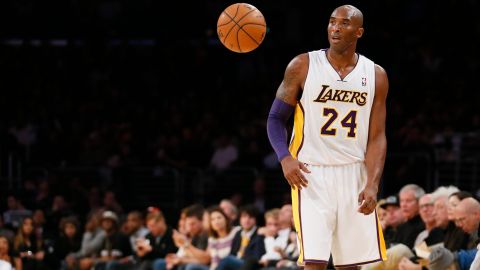 Los Angeles Lakers' Kobe Bryant allows the ball to bounce freely in front of him as he controls the ball against the Toronto Raptors during the first half of an NBA basketball game in Los Angeles, Sunday, Dec. 8, 2013. It was Bryant's first game back after a torn left Achilles tendon injury on April 12th and the Raptors won 106-94. (AP Photo/Danny Moloshok)