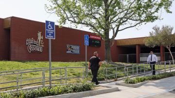 This Tuesday, April 11, 2017 photo shows the entrance to North Park Elementary School in San Bernardino, Calif., following the shooting death of a teacher and a student on Monday. Classes are scheduled to resume Monday, April 17, with additional personnel and crisis counselors on hand to help students who may need support. The school will also have enhanced security procedures. (AP Photo/Reed Saxon)
