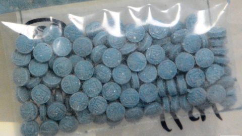 This undated photo made available by the U.S. Drug Enforcement Administration shows heroin fentanyl pills. (DEA via AP)