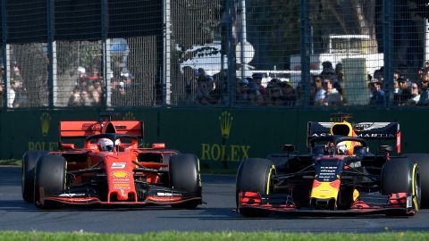 Red Bull driver Max Verstappen of the Netherlands, right, passes Ferrari driver Sebastian Vettel of Germany during the Australian Formula 1 Grand Prix in Melbourne, Australia, Sunday, March 17, 2019. (AP Photo/Andy Brownbill)