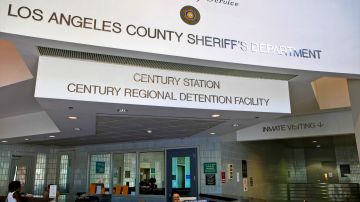 FILE - This July 19, 2010 file photo shows the lobby of the Los Angeles County Sheriff's Department Century Regional Detention Facility in Lynwood, Calif. Los Angeles County will pay $53 million to settle a lawsuit that alleged tens of thousands of women were given invasive group strip searches at a jail, according to court filings Tuesday, July 16, 2019. (AP Photo/Damian Dovarganes, File)