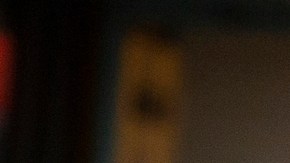 A pedestrian wears a face mask and gloves as she walks in the Chinatown neighborhood of Los Angeles on Thursday, April 2, 2020, during the coronavirus outbreak. (AP Photo/Damian Dovarganes)