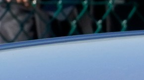 A traveler rides in the back of an Uber vehicle at Los Angeles International Airport in Los Angeles Friday, Nov. 13, 2020. Signs posted asks passengers to maintain 6 ft (2 m.) distance from other travelers. California has become the second state to record 1 million confirmed coronavirus infections. The governors of California, Oregon and Washington issued travel advisories Friday, urging people entering their states or returning from outside the states to self-quarantine to slow the spread of the coronavirus. (AP Photo/Damian Dovarganes)