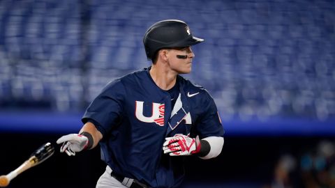 United States' Tyler Austin follows the flight of the ball after hitting a home run in the third inning of a baseball game against Israel at the 2020 Summer Olympics, Friday, July 30, 2021, in Yokohama, Japan. (AP Photo/c