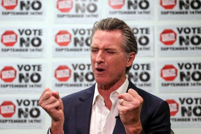 California Gov. Gavin Newsom is photographed during a TV interview before a rally against the California gubernatorial recall election on Sunday, Sept. 12, 2021, in Sun Valley, Calif. (AP Photo/Ringo H.W. Chiu)