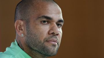 Brazil's Dani Alves listens to a question during a press conference on the eve of the group G of World Cup soccer match between Brazil and Cameroon in Doha, Qatar, Thursday, Dec. 1, 2022. (AP Photo/Andre Penner)