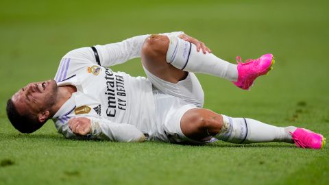 Real Madrid's Eden Hazard grimaces in pain during a Spanish La Liga soccer match between Real Madrid and Getafe at the Santiago Bernabeu stadium in Madrid, Spain, Saturday, May 13, 2023. (AP Photo/Manu Fernandez)