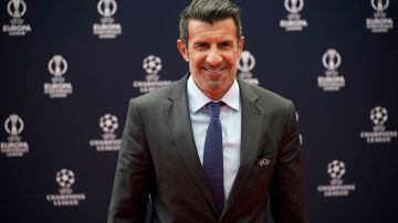 Former Portugal international Luis Figo arrives for the 2023/24 UEFA Europa League group stage draw at the Grimaldi Forum in Monaco, Friday, Sept. 1, 2023. (AP Photo/Daniel Cole)