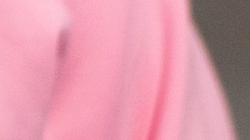 Inter Miami's Argentine forward Lionel Messi, center, poses for photos as he arrives at Hong Kong International airport with US Inter Miami CF team in Hong Kong, Friday, Feb. 2, 2024. (AP Photo/Louise Delmotte)