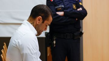 Brazilian soccer star Dani Alves sits during his trial in Barcelona, Spain, Monday, Feb. 5, 2024. Dani Alves goes on trial Monday a year after he allegedly sexually assaulted a young woman at a Barcelona nightclub. The 40-year-old Alves is accused of sexually assaulting the woman on the night of Dec. 30, 2022. He denies any wrongdoing. (Alberto Estevez/Pool Photo via AP)