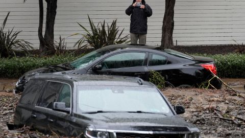 Submerged vehicles are photographed after a mudslide, Monday, Feb. 5, 2024, in the Beverly Crest area of Los Angeles. (AP Photo/Marcio Jose Sanchez)