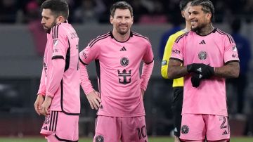 Inter Miami's Lionel Messi, center, reacts with teammates during a penalty shootout at the friendly soccer match between Vissel Kobe and Inter Miami CF at the National Stadium, Wednesday, Feb. 7, 2024, in Tokyo, Japan. (AP Photo/Eugene Hoshiko)
