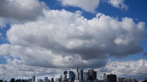 Clouds hover over the Los Angeles skyline, Wednesday, Feb. 7, 2024, in this view from Hacienda Heights, Calif. (AP Photo/Damian Dovarganes)