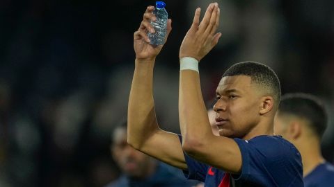 PSG's Kylian Mbappe celebrates at the end of the Champions League round of 16 first leg soccer match between Paris Saint-Germain and Real Sociedad, at the Parc des Princes stadium in Paris, France, Wednesday, Feb. 14, 2024. (AP Photo/Christophe Ena)