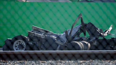 This tractor portion of a big rig is seen damaged on Thursday, Feb. 15, 2024 in the Wilmington section of Los Angeles. Several Los Angeles firefighters were injured, two critically, when an explosion occurred as they responded to a truck with pressurized cylinders that were on fire early Thursday, authorities said. (AP Photo/Eric Thayer)